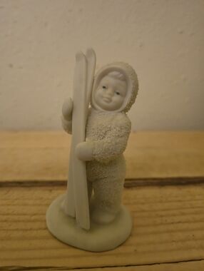 Snow baby - White Porcelain Eskimo Child Figurine with Skis